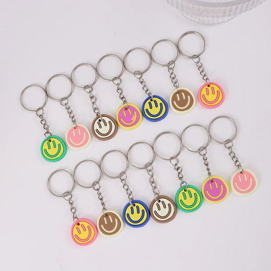 14pcs Cartoon Smile Face Keychain Set – Cute PVC Charms for Bags, Keys & Party Favors